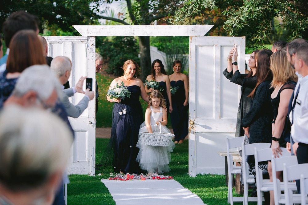 bridesmaids walking down the aisle