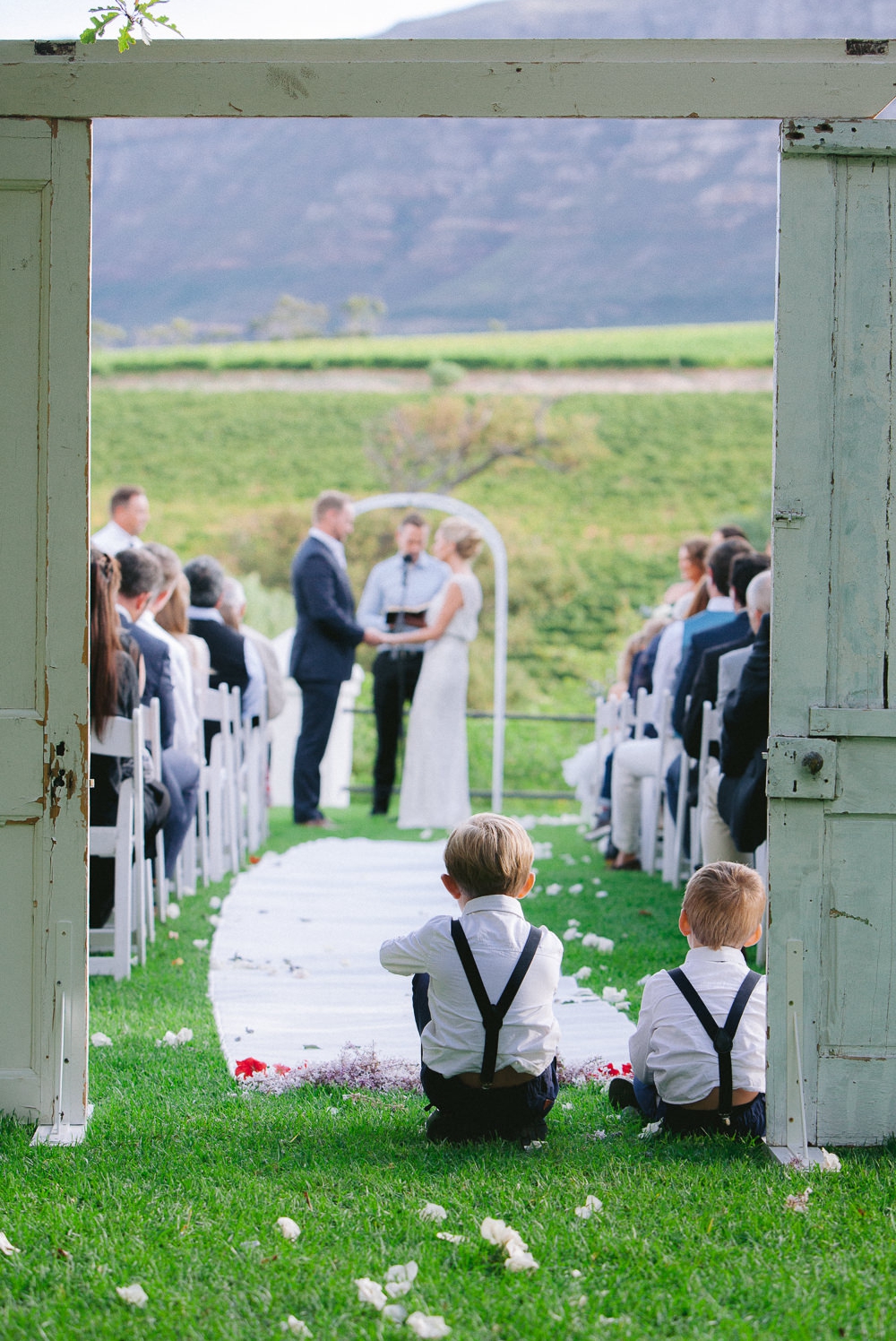 wedding ceremony under the watchful eyes of the pageboys
