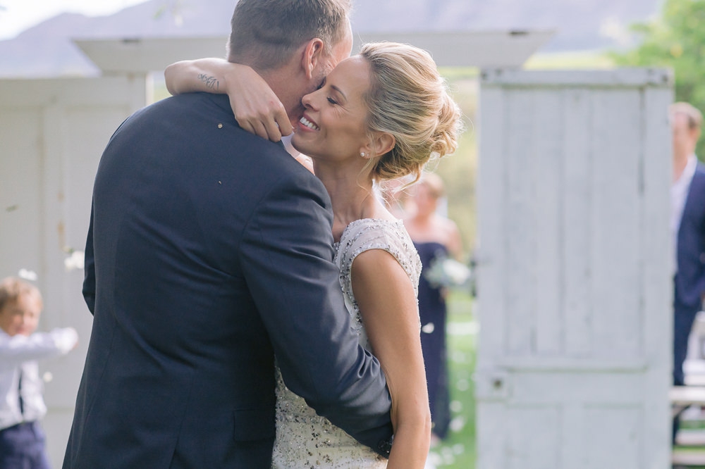 bride and groom hug