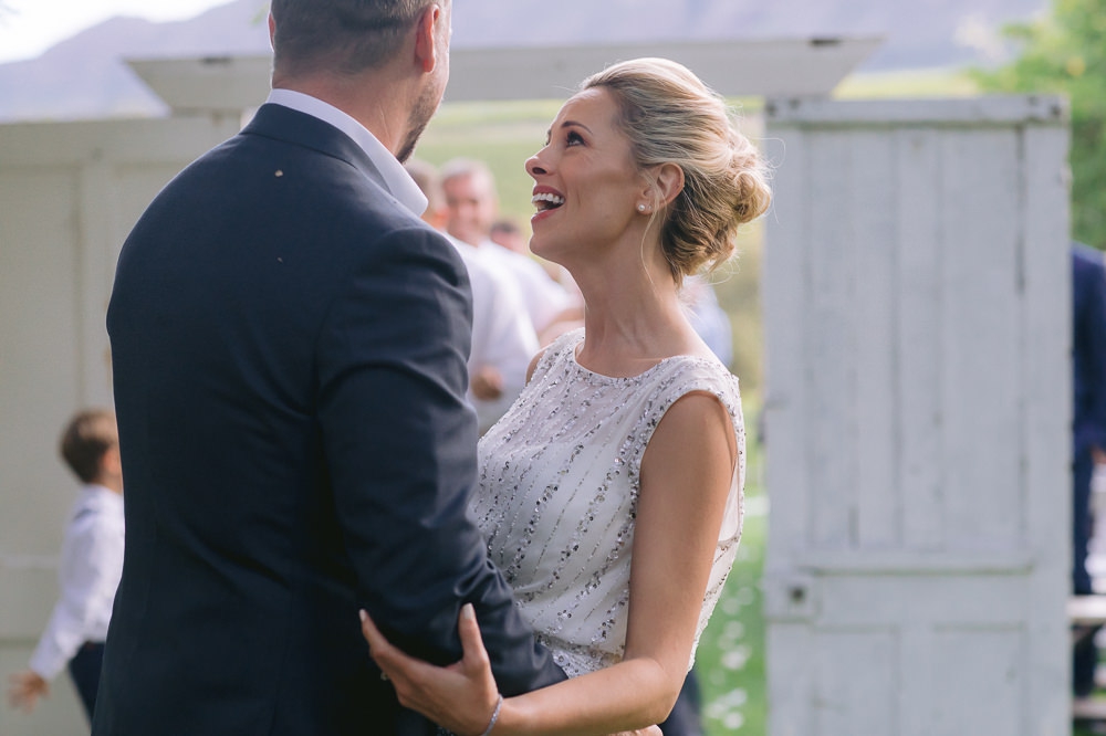 happy bride with groom