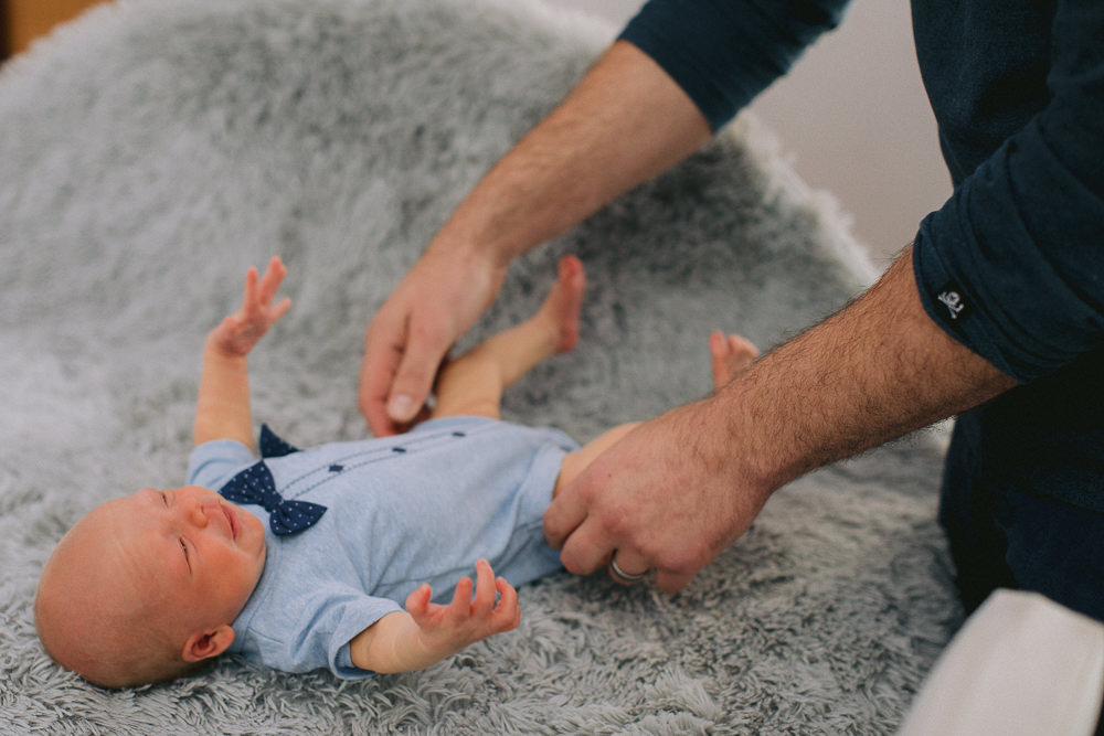 daddy changing baby